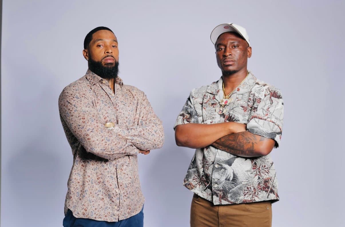Q and HungryHumble Hurc standing together